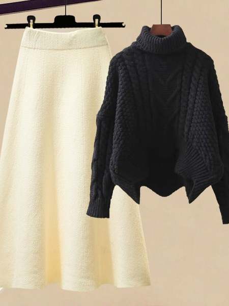 ブラックセーター+アプリコットスカート